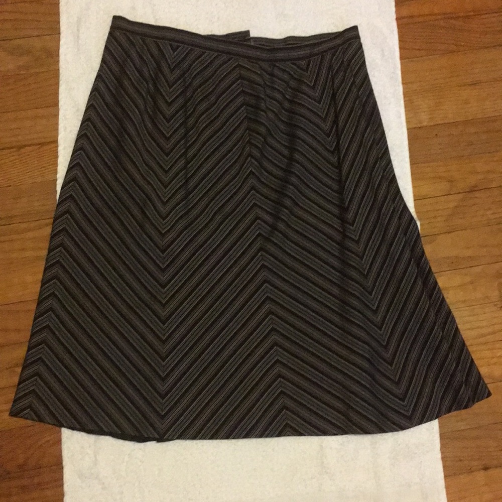 Black striped skirt.